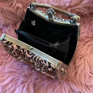 Hand beaded evening 🐆👛